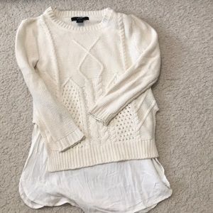 Cream sweater with white shirt underneath!